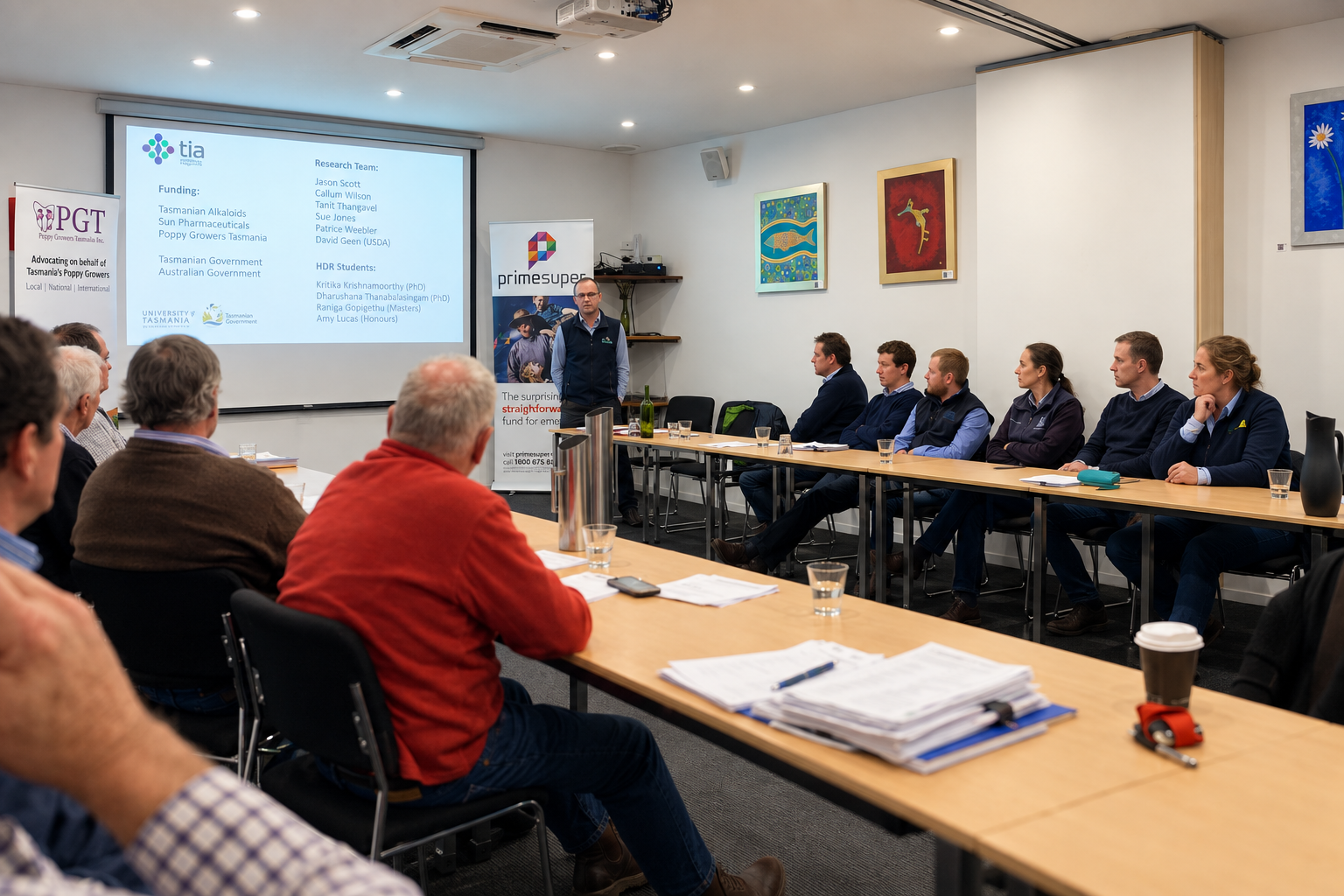 Participants listening to a presentation at an industry meeting